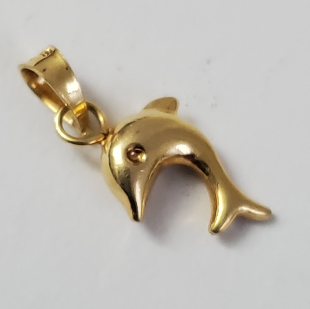 14K Gold Dolphin Pendant – A Playful Symbol of Grace and Freedom